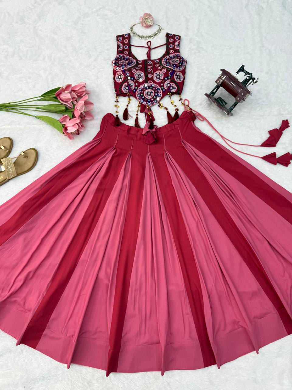 Wine Pink Embroidered Lehenga Choli with Mirror Work & Tassel Detailing